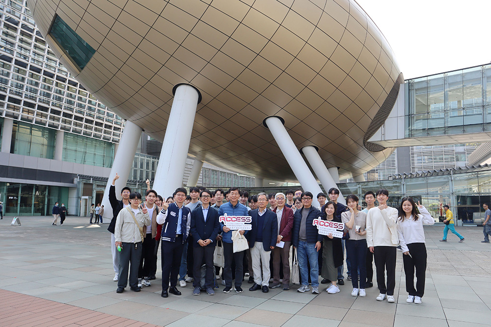 The delegation from the KAIST and Science Tokyo took photos in front of the iconic landmark “Charles K. Kao Auditorium” of Hong Kong Science Park.